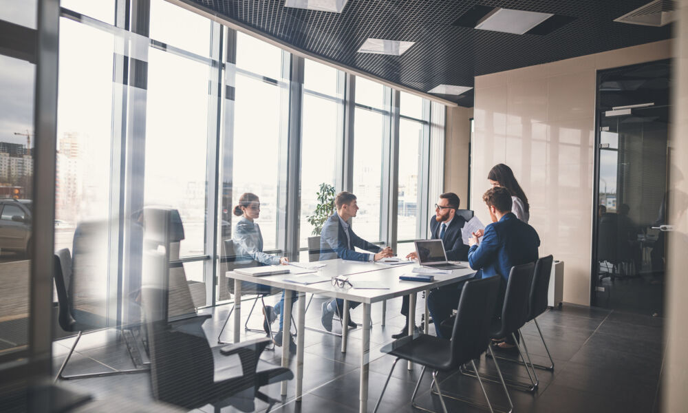 Corporate business team and manager in a meeting